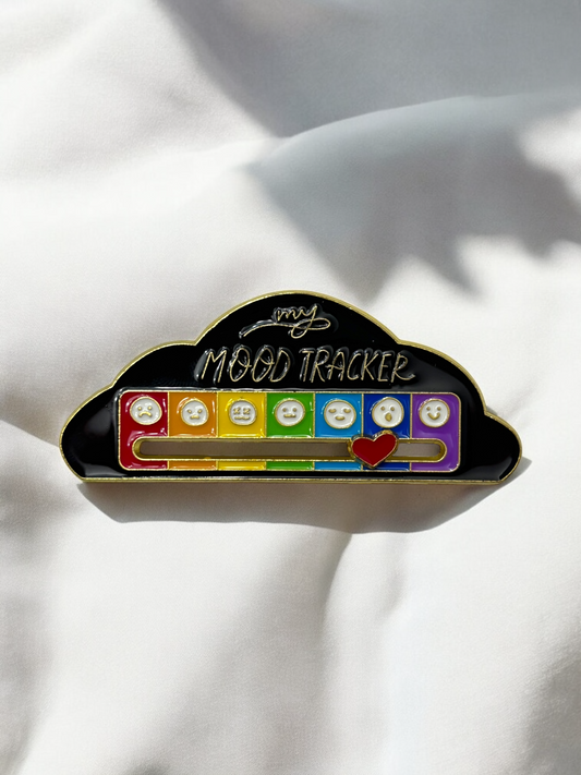 Black Mood Tracker brooch in the shape of a cloud with a red heart